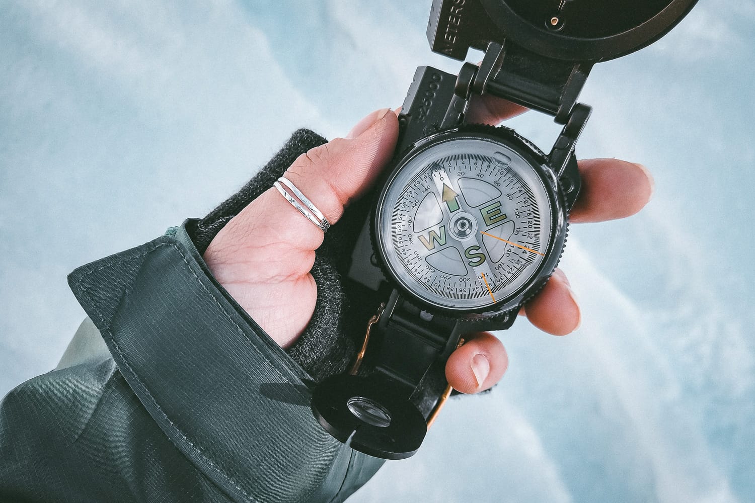 Holding a compass in winter