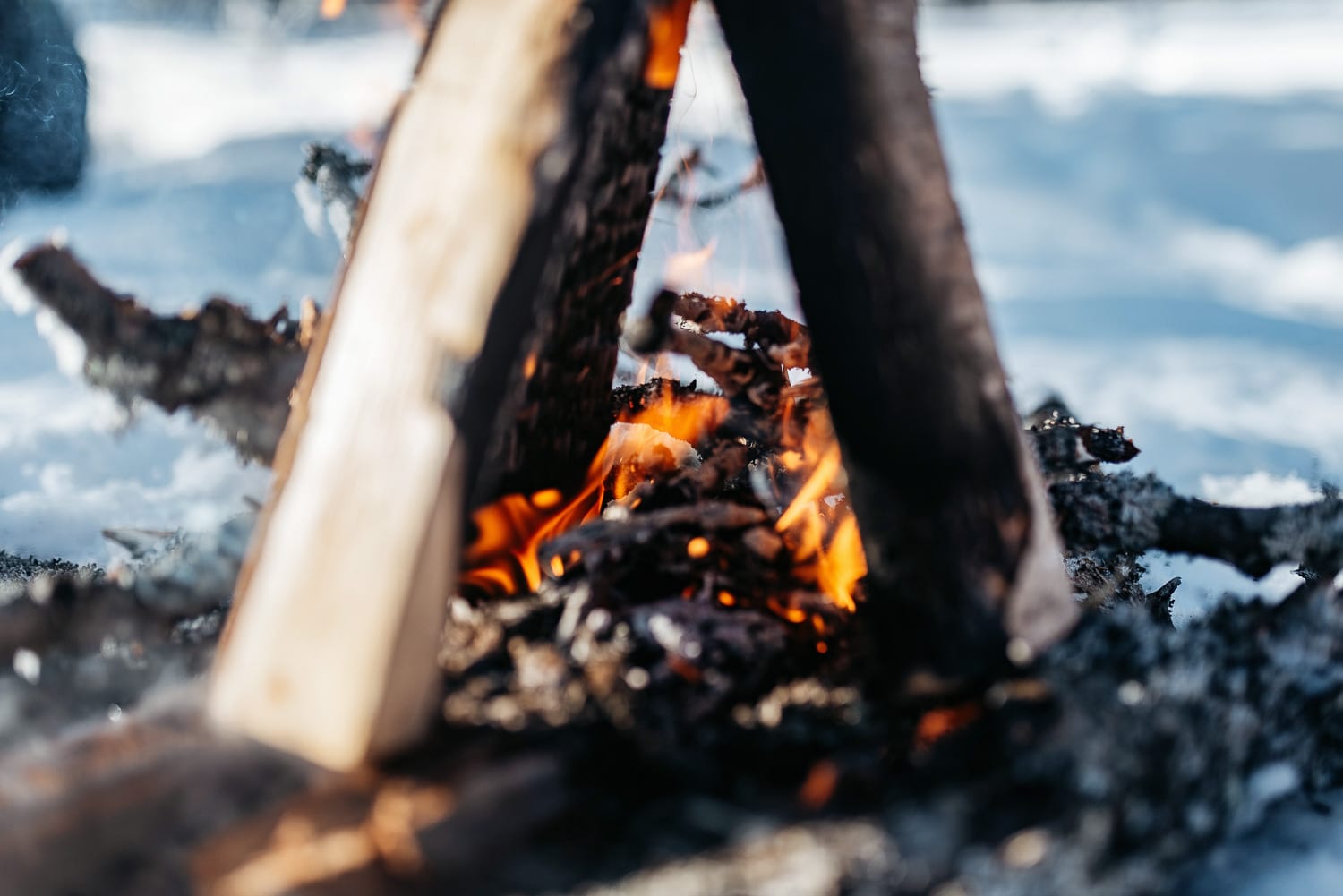 Camp fire out in the snow