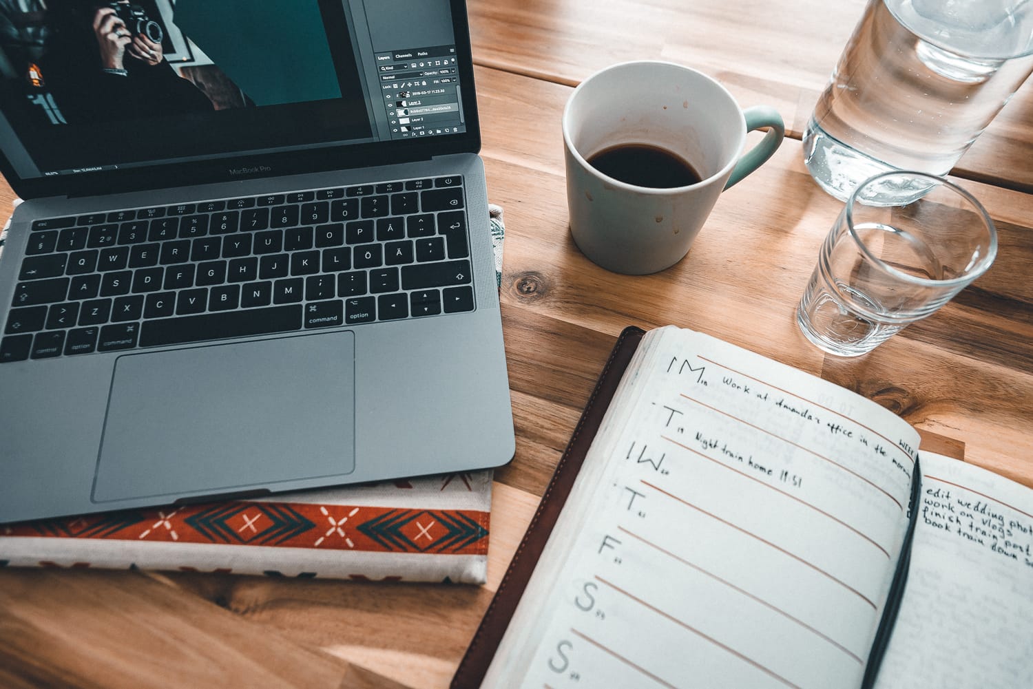 Laptop, calendar and coffee