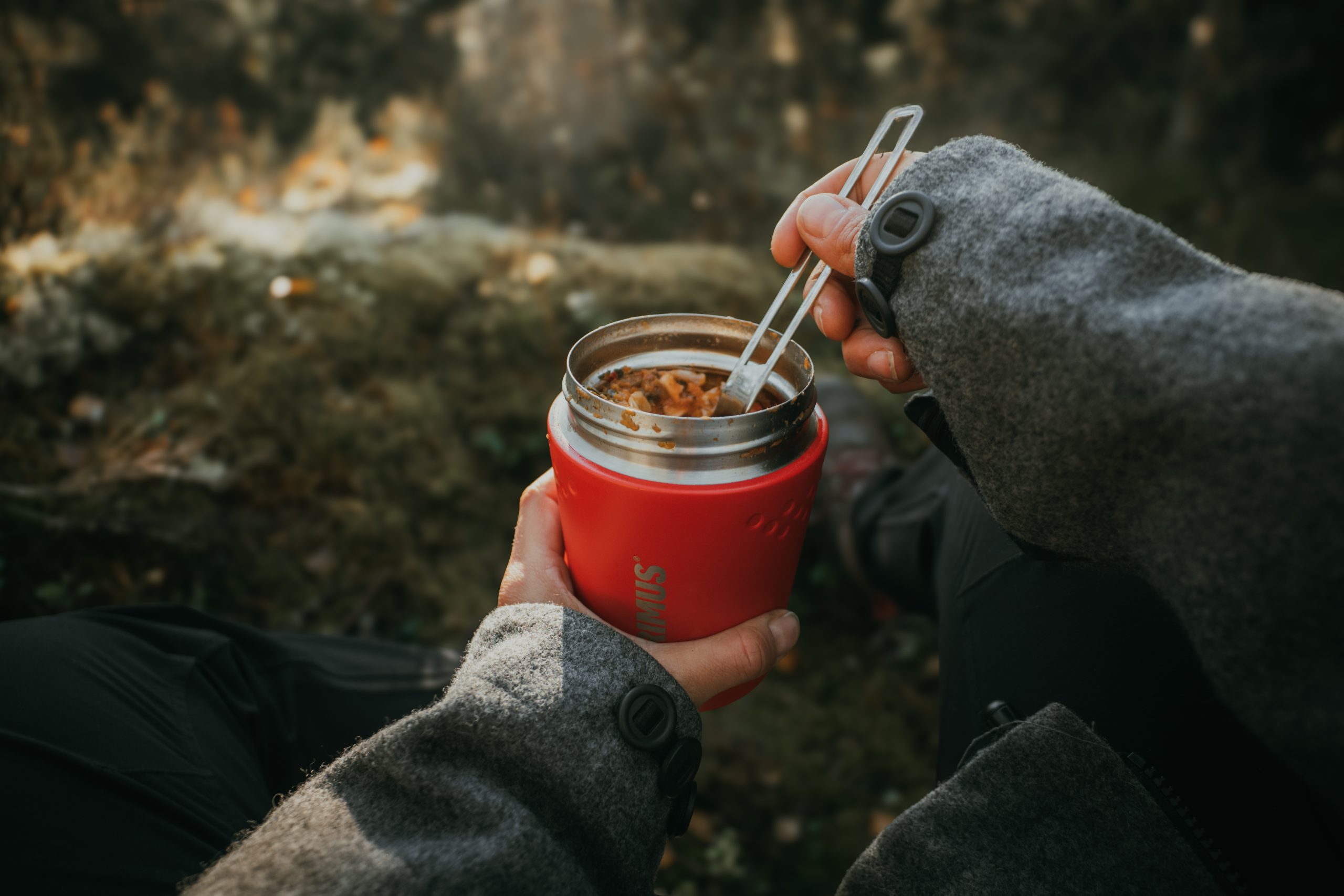 primus thermos with soup in the forest